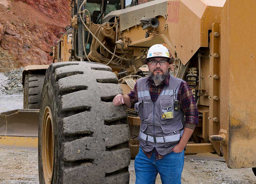 Gary Benavidez worked his way up from utility crew member to a support equipment operator.