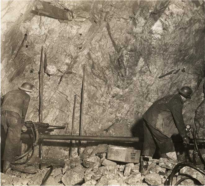 Underground workers prepare blast holes at the Climax mine in this undated, historical photo.