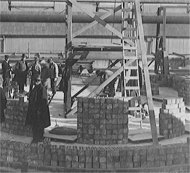 The foundation of the Miami smelter smokestack began in 1914; it was torn down in 2023.