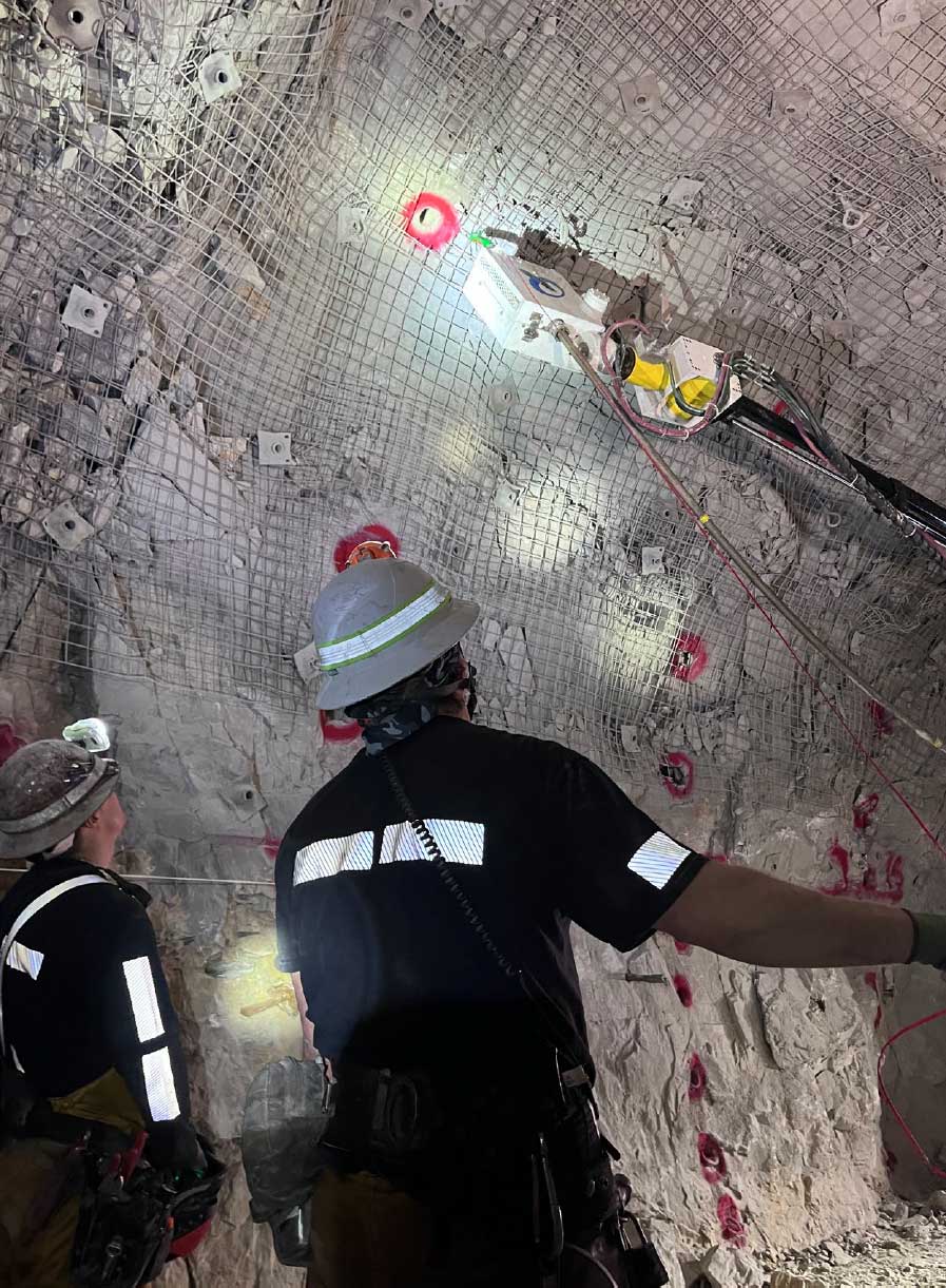 A blasting crew uses a remotely controlled emulsion rig at Henderson's North Panel.