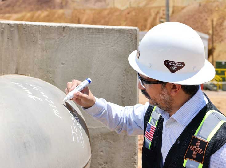 Jose Carrasco adds his signature to a pipe at North Lampbright.