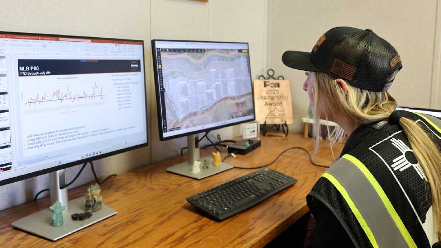 Raven Jackson reviews stockpile data at her workstation.