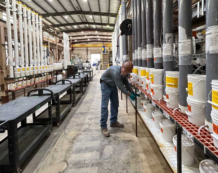 Jarid Gardner monitors column testing at the Leaching Excellence Center near Safford.