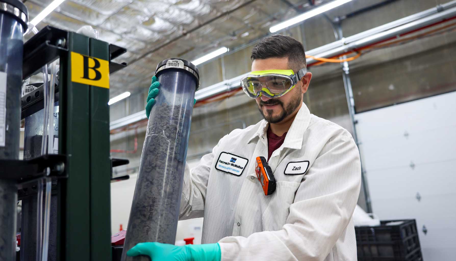 Zachary Ruetz secures a loaded column cell for additive testing at the Center for Innovative Solutions Tucson.